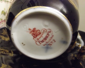 This is the mark of Gardner porcelain. It is fascinating that a simple English name like Gardner becomes a wonder when written in Cyrillic. 
