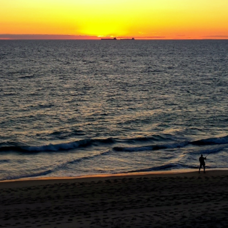 "Freo" as West Aussies foldly refer to Fremantle has the most beautiful beaches. A late finish to work today and I was luckily driving home when I saw this sunset, the fisherman and the cargo ships on the horizon. Thank you camera phone!